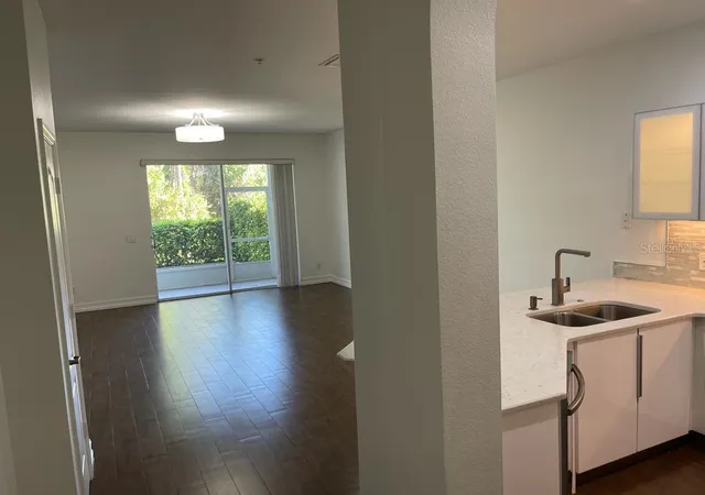 Photo 3 of Townhouse for sale at 3153 Capri Isle Way, Orlando, FL 32835 | MLS# O6396126 | Listing updated on 2026-08-31