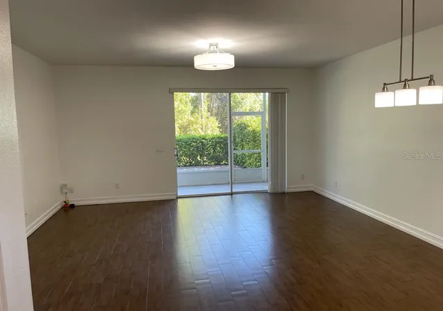 Photo 3 of Townhouse for sale at 3153 Capri Isle Way, Orlando, FL 32835 | MLS# O6396126 | Listing updated on 2026-08-31