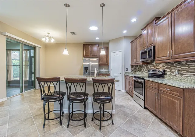 Photo 4 of Single family home for sale at 9936 Gap Wedge Dr, San Antonio, FL 33576 | MLS# TB8493850 | Listing updated on 2026-10-09