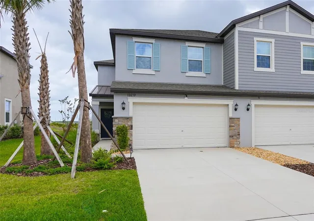 Photo 4 of Townhouse for sale at 10059 Trumpet Honeysuckle Way, San Antonio, FL 33576 | MLS# TB8493876 | Listing updated on 2026-06-13