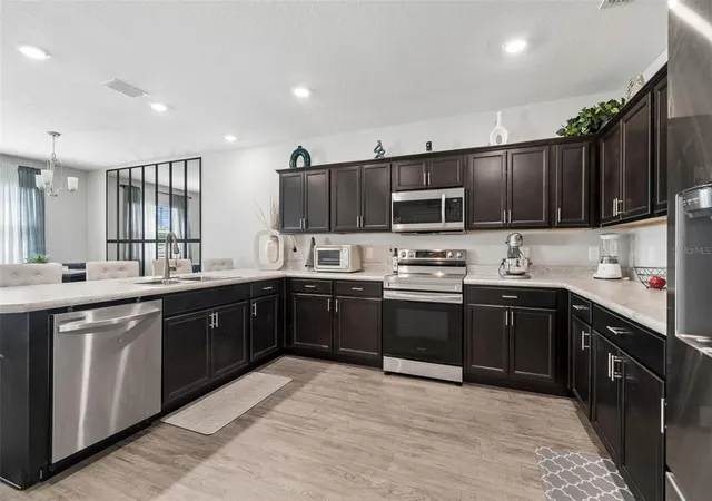 Photo 3 of Single family home for sale at 6396 Gardner Dr, Lakeland, FL 33813 | MLS# TB8493909 | Listing updated on 2026-09-04
