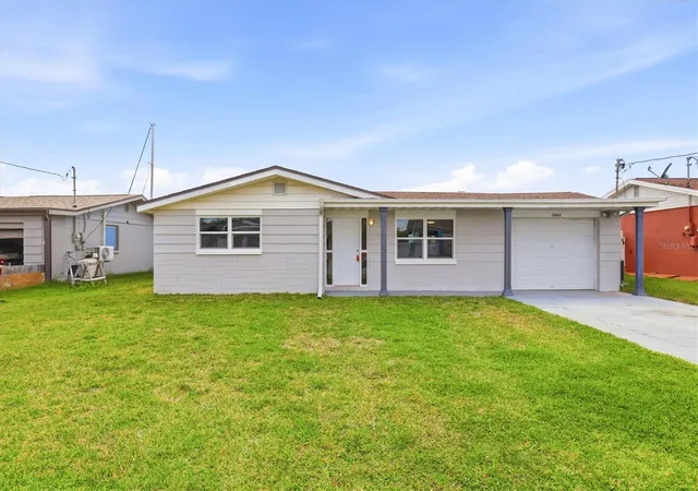 Photo 2 of Single family home for sale at 13603 Britton Dr, Hudson, FL 34667 | MLS# W7884557 | Listing updated on 2026-05-04