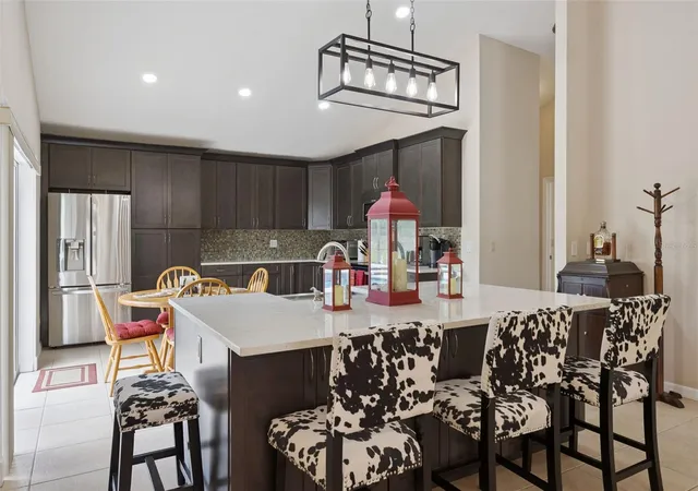 4th image of 7833 Golf Paradise Wy, Clermont, FL 34711 | MLS# O6396447
