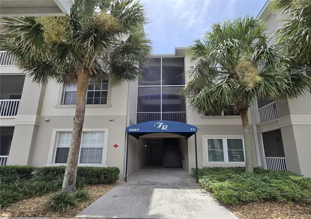 Listing Photo 1 - Condo for sale in building located at 3001 Laurel Run Ln, Kissimmee, FL 34741 - Unit #203
