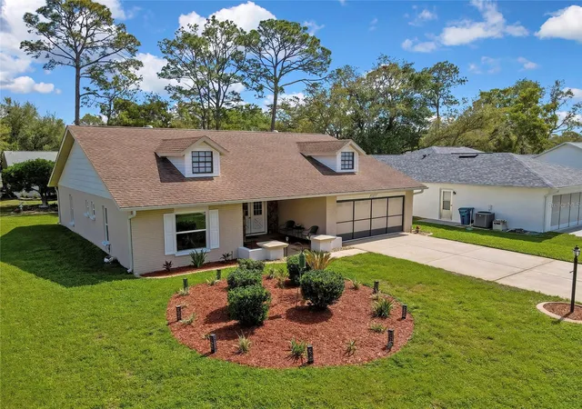1st image of 6433 Lost Tree Ln, Spring Hill, FL 34606 | MLS# W7884566