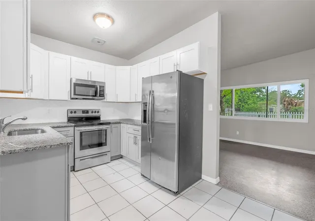 Photo 3 of Single family home for sale at 1712 Tallahassee Dr, Daytona Beach, FL 32117 | MLS# V4948345 | Listing updated on 2026-10-05