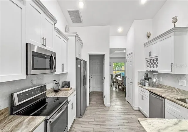 4th image of 2917 12th Street SW, Lehigh Acres, FL 33976 | MLS# C7524360