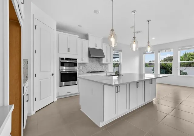 4th image of 957 Ladyfish Trl, Saint Cloud, FL 34771 | MLS# O6396664