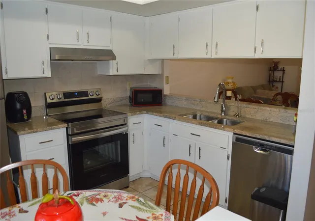 Photo 4 of Condo for sale at 38359 Ironwood Pl #38359, Zephyrhills, FL 33542 | MLS# TB8494526 | Listing updated on 2026-09-04