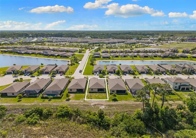 Photo 2 of Single family home for sale at 1842 W Isles Rd, Port Charlotte, FL 33953 | MLS# A4689029 | Listing updated on 2026-09-21