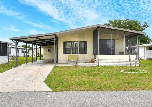 Photo 2 of Manufactured home for sale at 6473 Peppertree Path Ne, Winter Haven, FL 33881 | MLS# P4938365 | Listing updated on 2026-06-18