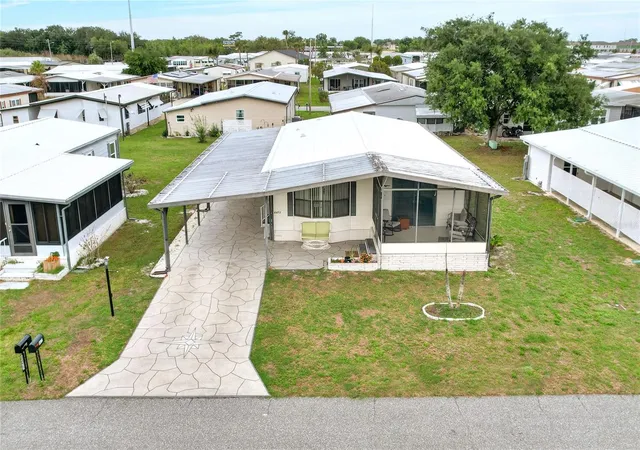 Photo 3 of Manufactured home for sale at 6473 Peppertree Path Ne, Winter Haven, FL 33881 | MLS# P4938365 | Listing updated on 2026-06-18