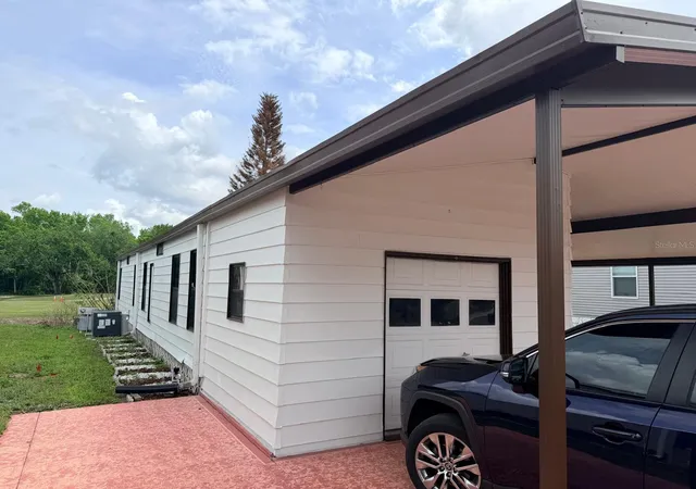 Photo 2 of Manufactured home for sale at 2173 Pebble Beach Blvd, Orlando, FL 32826 | MLS# O6396809 | Listing updated on 2026-09-23