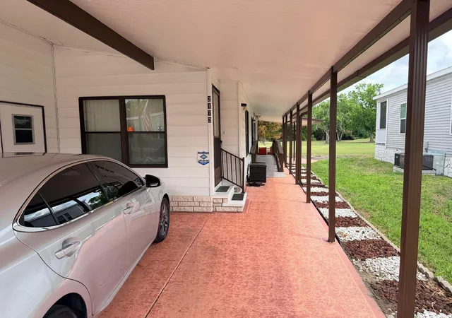 Photo 3 of Manufactured home for sale at 2173 Pebble Beach Blvd, Orlando, FL 32826 | MLS# O6396809 | Listing updated on 2026-09-23