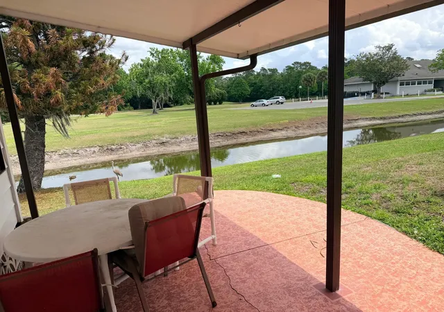 Photo 4 of Manufactured home for sale at 2173 Pebble Beach Blvd, Orlando, FL 32826 | MLS# O6396809 | Listing updated on 2026-09-23