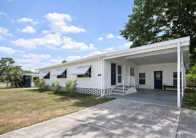 Photo 2 of Manufactured home for sale at 7110 Commons Blvd, Port Richey, FL 34668 | MLS# TB8494663 | Listing updated on 2026-09-02