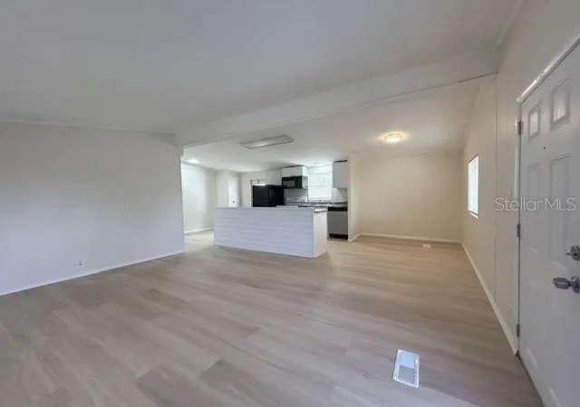 Photo 3 of Manufactured home for sale at 7110 Commons Blvd, Port Richey, FL 34668 | MLS# TB8494663 | Listing updated on 2026-09-02
