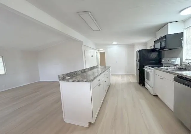Photo 5 of Manufactured home for sale at 7110 Commons Blvd, Port Richey, FL 34668 | MLS# TB8494663 | Listing updated on 2026-09-02