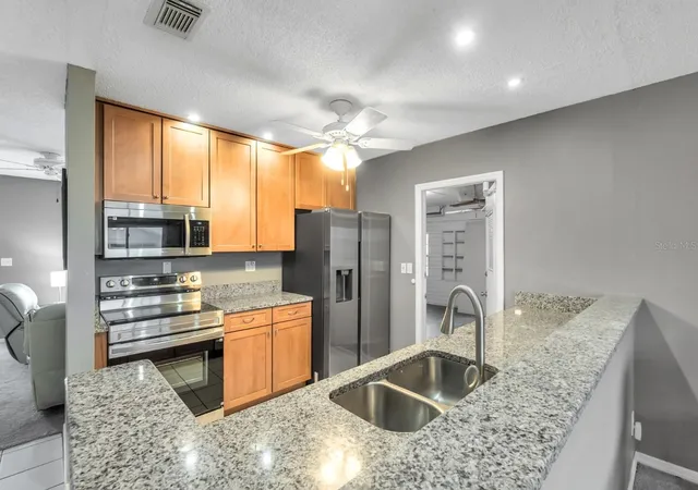Photo 1 of Condo for sale at 702 Huxley Pl, Sun City Center, FL 33573 | MLS# A4689086 | Listing updated on 2026-09-04