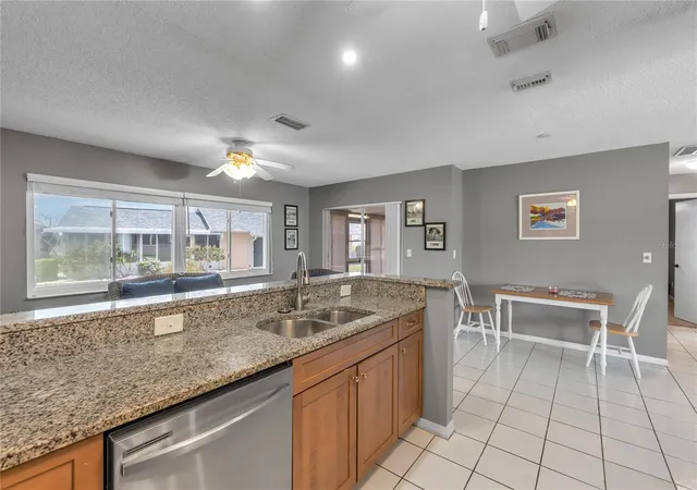 Photo 2 of Condo for sale at 702 Huxley Pl, Sun City Center, FL 33573 | MLS# A4689086 | Listing updated on 2026-09-04