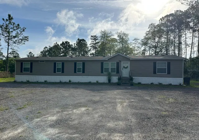 Photo 1 of Manufactured home for sale at 1583 Beech Blvd, Bunnell, FL 32110 | MLS# FC317515 | Listing updated on 2026-09-02