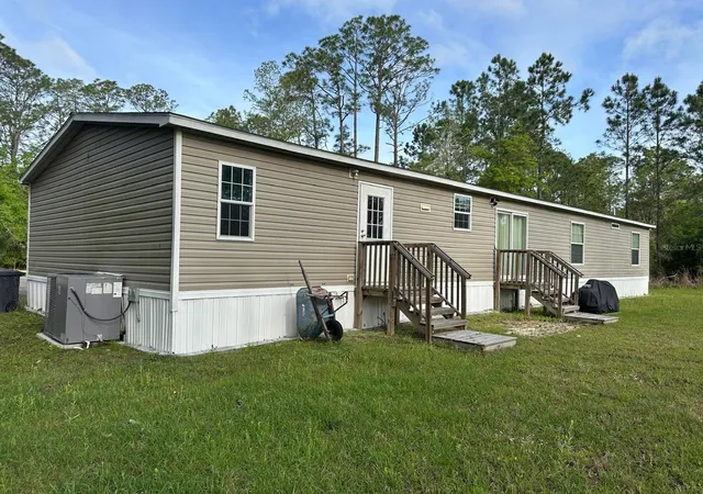 Photo 2 of Manufactured home for sale at 1583 Beech Blvd, Bunnell, FL 32110 | MLS# FC317515 | Listing updated on 2026-09-02