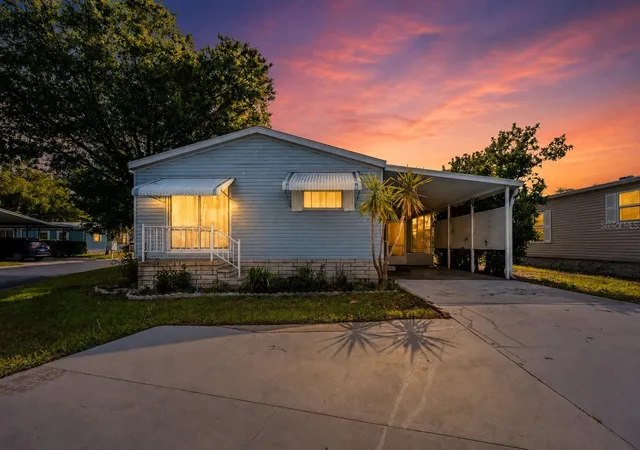 Photo 1 of Manufactured home for sale at 3210 Hickory Dr, Wesley Chapel, FL 33543 | MLS# TB8494702 | Listing updated on 2026-09-28