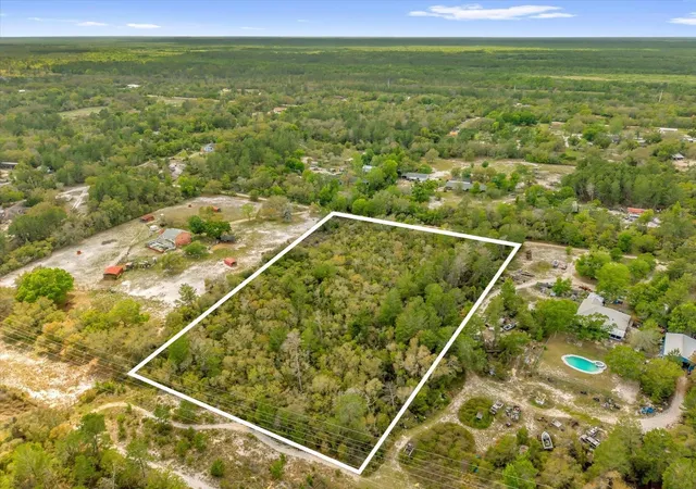 1st image of Chestnut Ave, Orange City, FL 32763 | MLS# O6396891