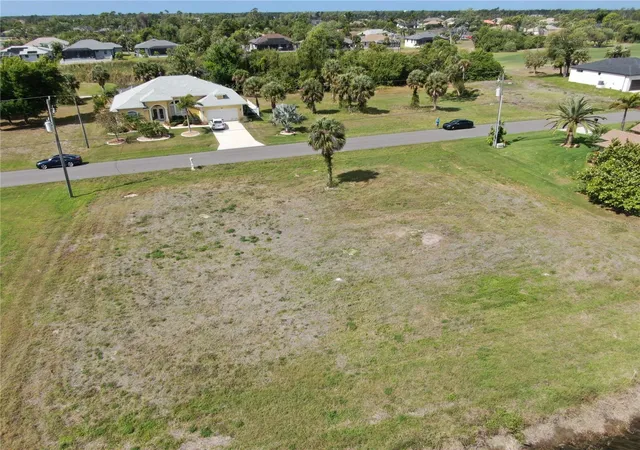 3rd image of 35 & 37 Tournament Rd, Rotonda West, FL 33947 | MLS# D6146938