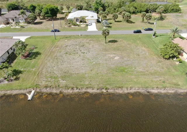 4th image of 35 & 37 Tournament Rd, Rotonda West, FL 33947 | MLS# D6146938