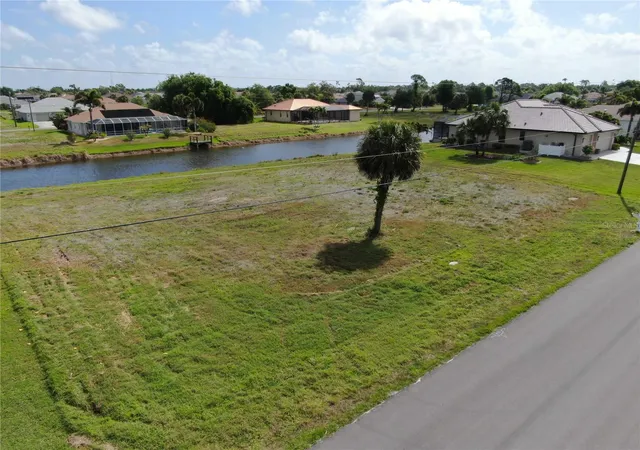 5th image of 35 & 37 Tournament Rd, Rotonda West, FL 33947 | MLS# D6146938