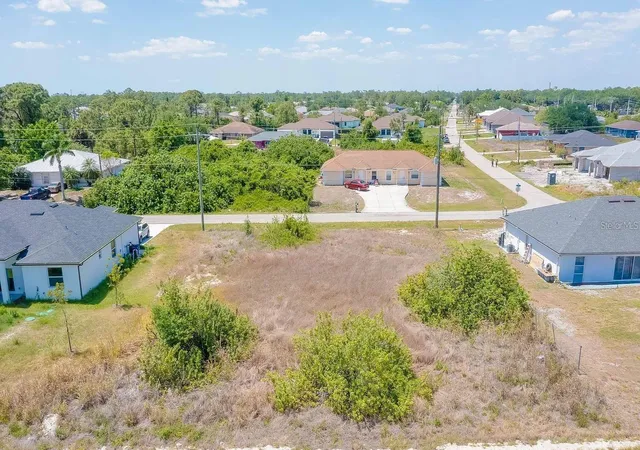 Photo 1 of Land for sale at 2405/2407 Ansel Ave S, Lehigh Acres, FL 33973 | MLS# C7524488 | Listing updated on 2026-09-02