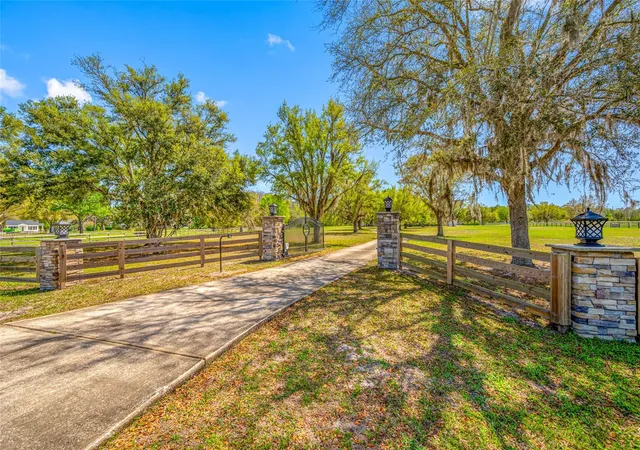Photo 3 of Single family home for sale at 11939 Pasco Trails Blvd, Spring Hill, FL 34610 | MLS# W7884639 | Listing updated on 2026-05-14