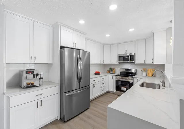 Photo 3 of Condo for sale at 100 Blf View Dr #404C, Belleair Bluffs, FL 33770 | MLS# TB8495261 | Listing updated on 2026-10-04