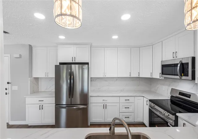 Photo 4 of Condo for sale at 100 Blf View Dr #404C, Belleair Bluffs, FL 33770 | MLS# TB8495261 | Listing updated on 2026-10-04