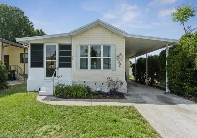 Photo 2 of Manufactured home for sale at 50989 Highway 27 #21, Davenport, FL 33897 | MLS# O6397448 | Listing updated on 2026-09-18