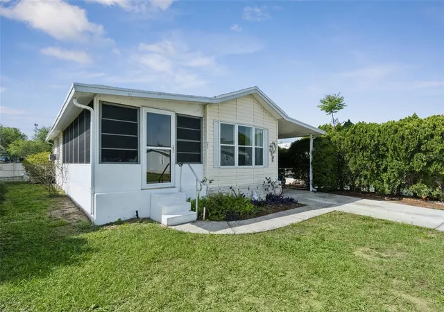 Photo 3 of Manufactured home for sale at 50989 Highway 27 #21, Davenport, FL 33897 | MLS# O6397448 | Listing updated on 2026-09-18