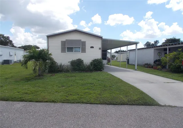 Photo 2 of Manufactured home for sale at 6420 Haele Ct, North Port, FL 34287 | MLS# C7524548 | Listing updated on 2026-09-27