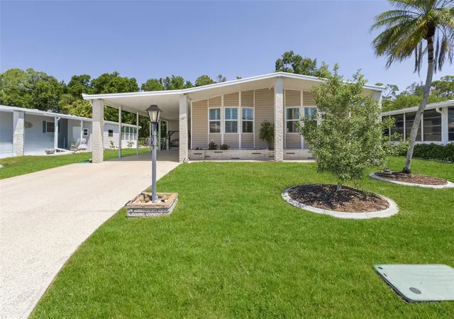 Photo 1 of Manufactured home for sale at 209 Vistoria Dr, North Port, FL 34287 | MLS# TB8495553 | Listing updated on 2026-09-22