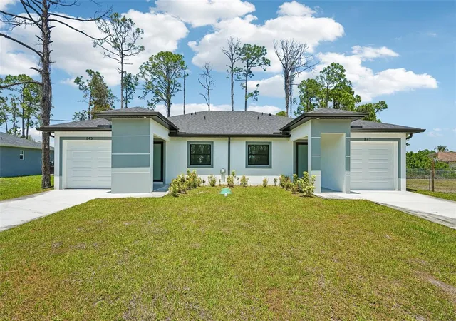 Photo 1 of Multi family home for sale at 845/847 Meadow Rd, Lehigh Acres, FL 33973 | MLS# C7524552 | Listing updated on 2026-06-08