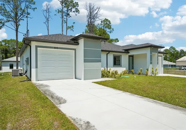 Photo 2 of Multi family home for sale at 845/847 Meadow Rd, Lehigh Acres, FL 33973 | MLS# C7524552 | Listing updated on 2026-06-08