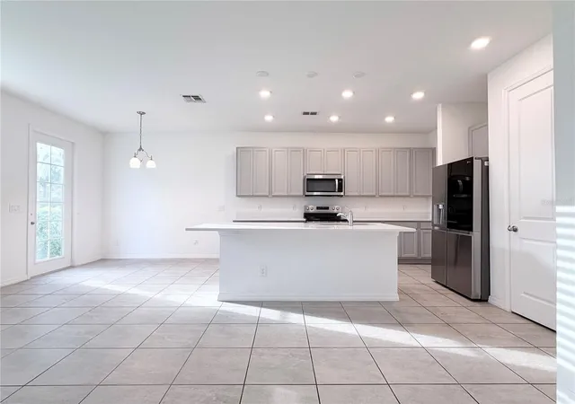 Photo 5 of Townhouse for sale at 1542 Discovery St, Davenport, FL 33896 | MLS# O6397625 | Listing updated on 2026-08-30