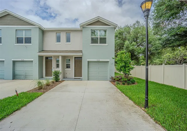 Photo 1 of Townhouse for sale at 6358 Sophie Oaks Ct, Tampa, FL 33610 | MLS# TB8495850 | Listing updated on 2026-08-11