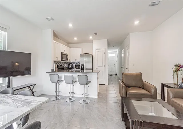 Photo 3 of Townhouse for sale at 6358 Sophie Oaks Ct, Tampa, FL 33610 | MLS# TB8495850 | Listing updated on 2026-08-11