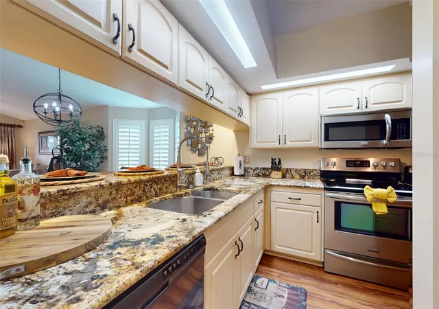 Listing Photo 2 - Condo for sale in building located at 402 Bouchelle Dr, New Smyrna Beach, FL 32169 - Unit #206