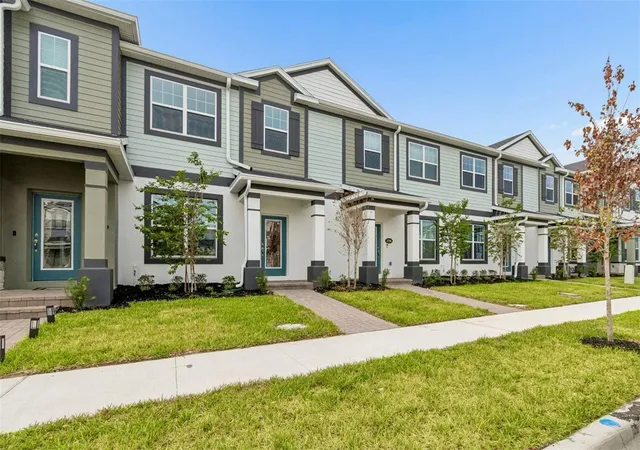 Photo 1 of Townhouse for sale at 1402 Mount Royal Dr, Saint Cloud, FL 34771 | MLS# O6397886 | Listing updated on 2026-07-07