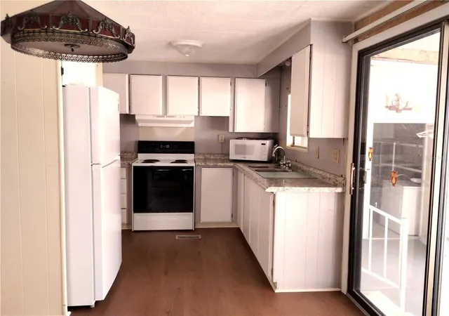 Photo 3 of Manufactured home for sale at 7409 Skyline Dr, Hudson, FL 34667 | MLS# W7884734 | Listing updated on 2026-06-09