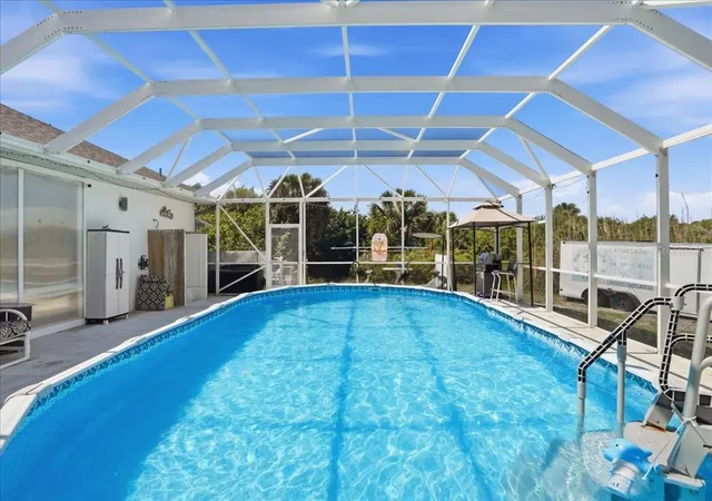 Photo 3 of Single family home for sale at 6993 Manniz Rd, Port Charlotte, FL 33981 | MLS# A4689642 | Listing updated on 2026-04-12