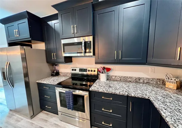 Listing Photo 4 - Condo for sale in building located at 5630 Queener Ave, PORT RICHEY, FL 34668