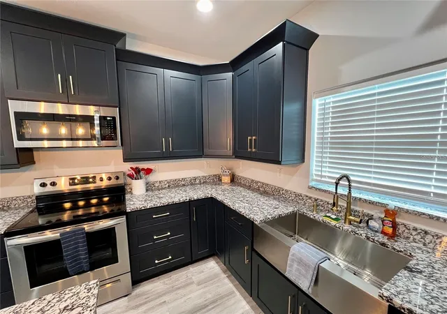 Listing Photo 5 - Condo for sale in building located at 5630 Queener Ave, PORT RICHEY, FL 34668